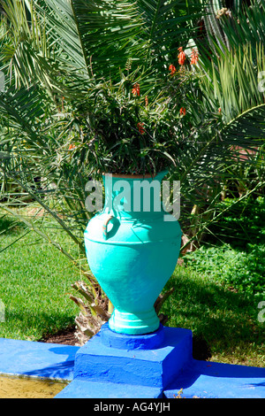 Morocco , Marrakesch , Majorelle Gardens , established by Yves Saint Laurent & Pierre Berge , bright colourful turquoise pot Stock Photo