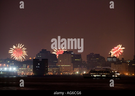 4th of July fireworks over downtown Manhattan in New York City USA seen from New Jersey 2006 Stock Photo