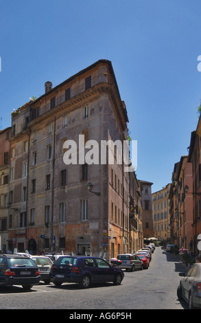 A back street in Rome, Italy, during summer looking at the walls of ...