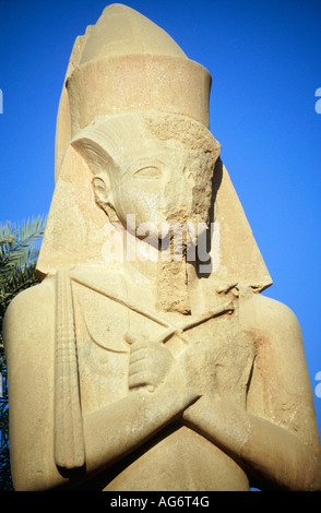 Karnak. Temple (Precinct) of Amun. Huge pink granite statue of Ramses 11. Head and shoulders. Stock Photo