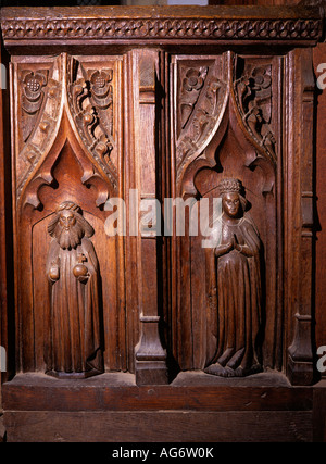 UK Suffolk Blythburgh Holy Trinity Church Royal figures carved in Medieval Choir Stall Stock Photo