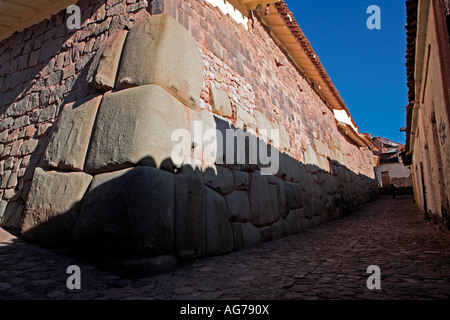 foundations of the former 14th century Palace of the Incan Ruler Inca Roca, Calle Hatun Rumiyoc, Cuzco, Peru Stock Photo