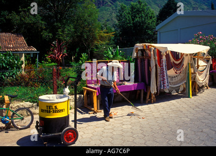 Guatemalan man street cleaner and vendor stalls Panajachel Solola Department Guatemala Stock Photo