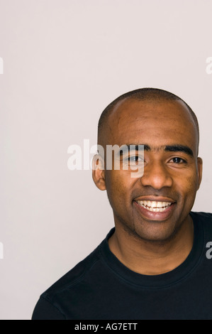 Close-up portrait of smiling African-American male. Stock Photo