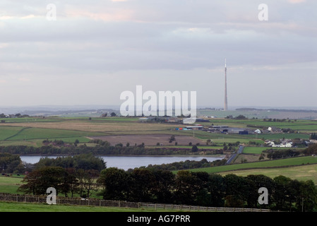 'Emley Moor' television mast and' warning lights' across Ingbirchworth reservoir in Yorkshire 'Great Britain' Stock Photo