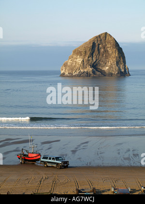 A view of the Pacific City dory fishing fleet launching from the beach in Pacific City Stock Photo