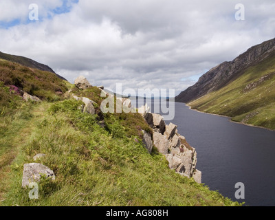 View north east along Llyn Cowlyd Reservoir below Creigiau Gleision in mountains of Snowdonia National Park Capel Curig Conwy Stock Photo