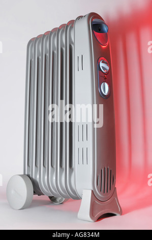 Electric oil filled radiator air heater Stock Photo