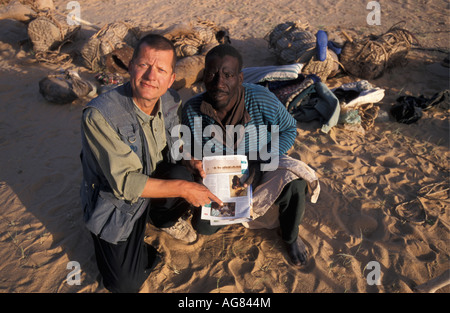 Niger Tenere Tuareg tribe doing salt caravan from Agadez to the oases Fachi Photographer Frans Lemmens shows former publication Stock Photo