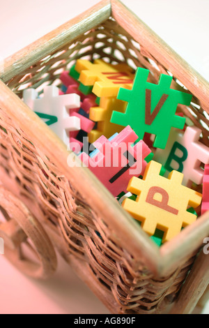 Alphabet Puzzles in Trolley Basket Stock Photo