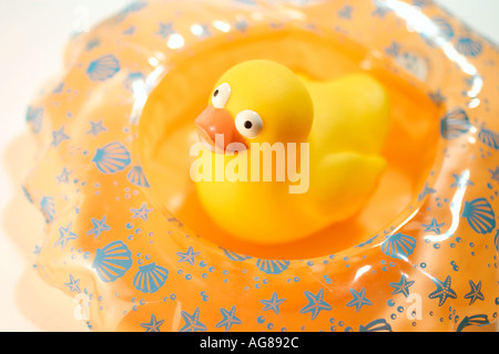 Rubber Ducking on Inflatable Floater Stock Photo