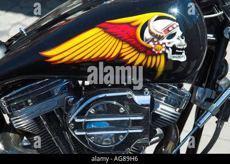 Painting of skull on the fuel tank of a Harley Davidson motorbike
