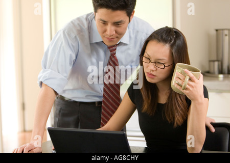 Couple Using Laptop Stock Photo