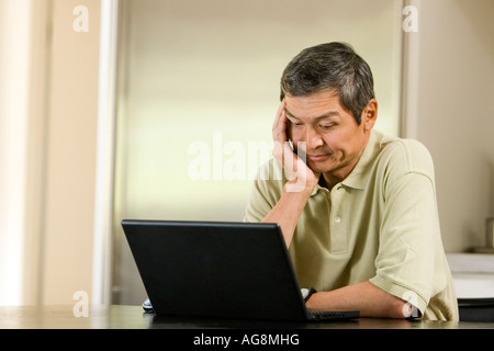 Senior Male on Laptop Stock Photo