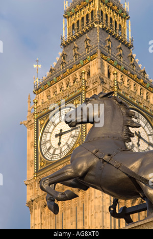 London St Stephen s Tower containing the bell called Big Ben The horse of the Queen Boadicea Statue England Stock Photo