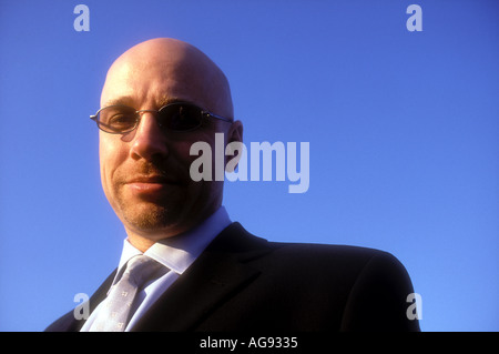 Bald man in suit Model released image Stock Photo