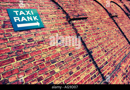 Taxi Rank sign on wall Stock Photo