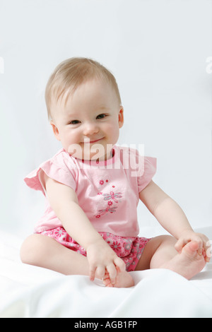 Full length colour studio portrait female wearing pink shirt and