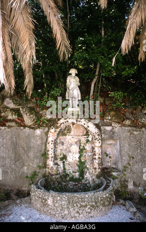 Small figure of Napoleon on fountain  in the garden of his residence,Villa Napoleon,San Martino, on the Isle of Elba ,Italy Stock Photo