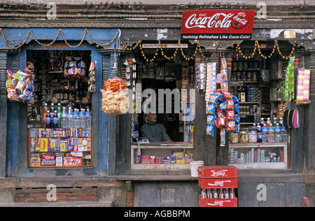 Nepal Kathmandu Senior man sitting in shop Stock Photo