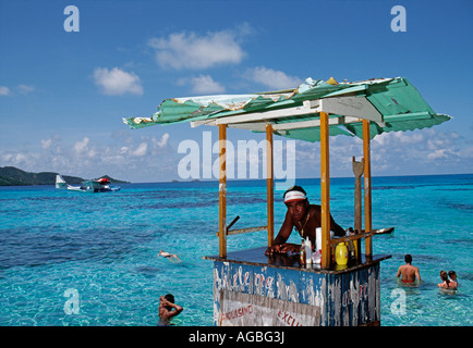 Bahamas Bimini Young man at bar in sea Stock Photo