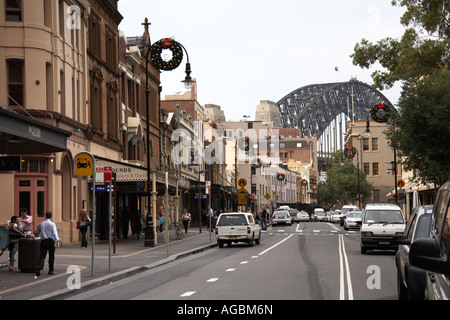 Old historic buildings and traffic on George St in the Rocks area of Sydney New South Wales NSW Australia Stock Photo