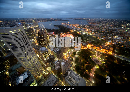 High level oblique aerial view north east of Hyde Park and harbour at dusk evening or twilight from Tower in Sydney NSW Austral Stock Photo