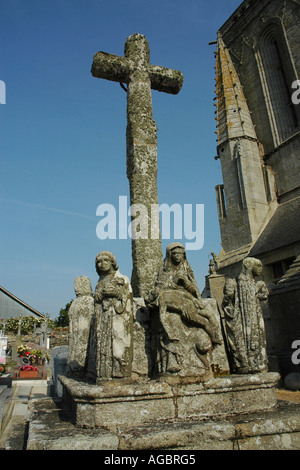 The striking stone calvary outside the 16th-century chapel on Brittany's Finistère coast dedicated to St Tugen, healer of rabies Stock Photo