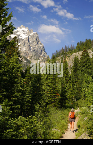A visitor on the Cascade Canyon Trail Grand Teton National Park Wyoming MR Stock Photo
