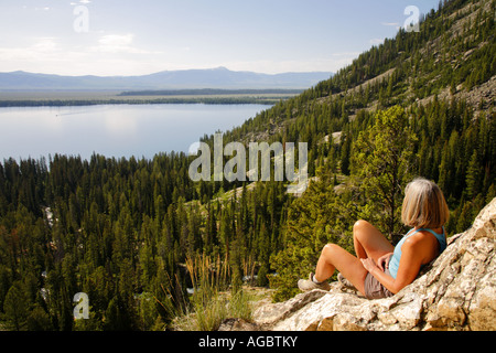 A visitor on the Cascade Canyon Trail Grand Teton National Park Wyoming MR Stock Photo