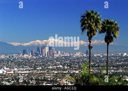 Snow covered San Gabriel Mountains behind downtown Los Angeles skyline Stock Photo