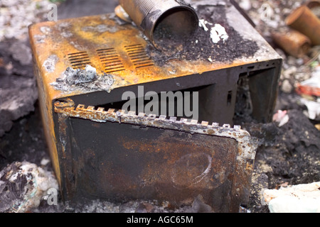 burnt out microwave oven in paddock Huddersfield Stock Photo