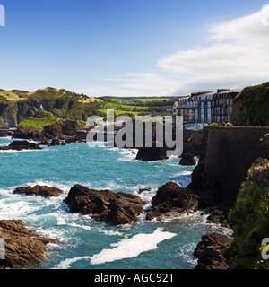 Devon - Seafront properties among the rocks and cliffs on the coast at Ilfracombe Devon UK Stock Photo