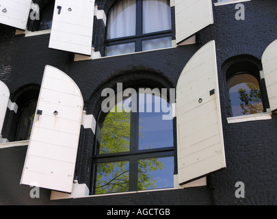 White Shutters on windows in Amsterdam Stock Photo