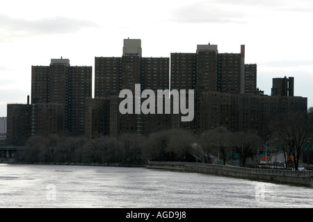 silhouettes of apartment blocks in Harlem from the east river new york city new york USA Stock Photo