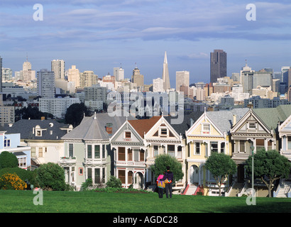 Victorian Houses on Steiner Street with San Francisco skyline Stock Photo