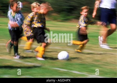 Boys in California city park playing soccer Stock Photo