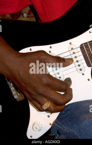 A musician playing an electric guitar on Beale Street in Memphis, Tennessee. Stock Photo