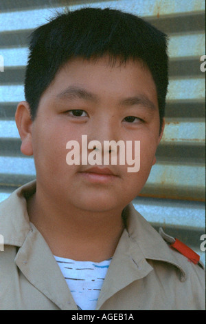 Boy Scout age 13 being somber at the Minnesota State Fair. St Paul Minnesota USA Stock Photo