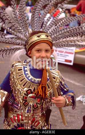 Aztec children dressed in traditional regalia learn to dance their ...