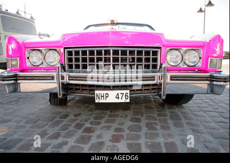 Pink Cadillac front view with Swedish  license plate
