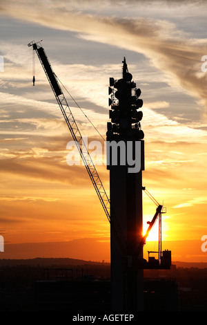 A crane in front of the BT Tower in Birmingham England UK Stock Photo