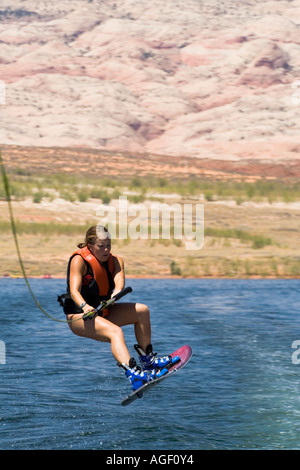 Girl wakeboarding at Lake Powell in Glen Canyon National Recreation ...