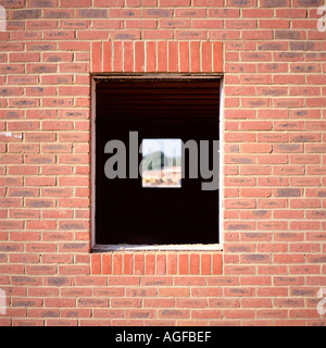 Brick wall with window Stock Photo