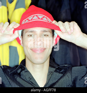 Young man wearing a knit hat Stock Photo
