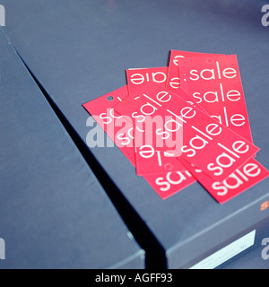 Sales labels on shoe box Stock Photo