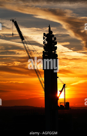 A crane in front of the BT Tower in Birmingham England UK Stock Photo