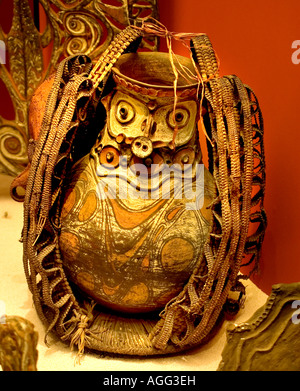 Authentic hand-painted Aibom sago storage pottery jar wrapped in traditional woven plant fibers, Chambri Lakes region, East Sepik Province, Papua New Stock Photo