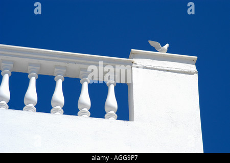 decorative balcony / terrace with sculpture, village of Oia, Santorini island, Greece Stock Photo