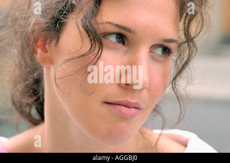 tired and unhappy / depressed young woman gazing Stock Photo